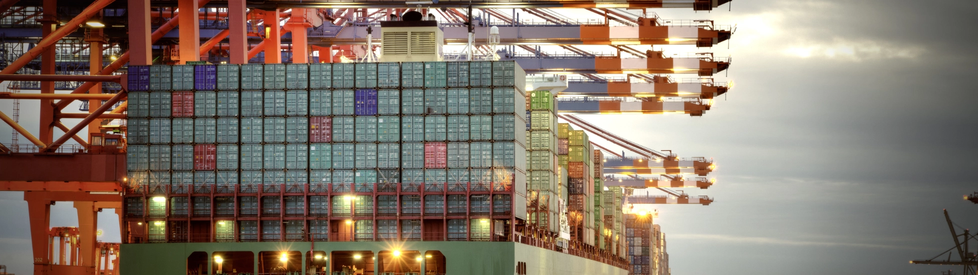 container ship docking at port international trade